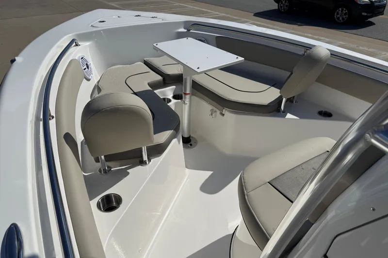 Slide: The Image of 2026 Key West 203 FS boat interior with seating and table setup. - 31
