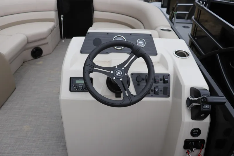 Slide: The Image of Steering console of 2025 Flagship Endurace 22 CU boat with modern controls and seating. - 6