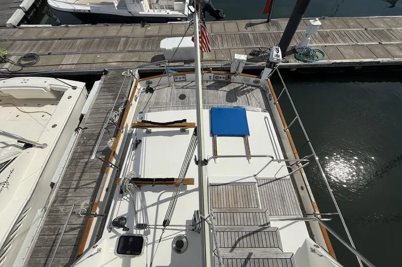 Slide: The Image of Overhead view of 1999 Grand Banks 42 Classic yacht docked at marina. - 18