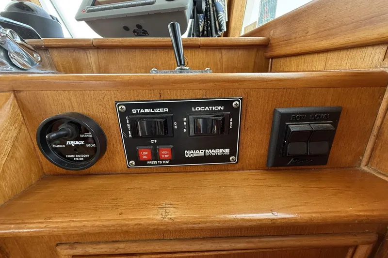 Slide: The Image of Control panel on 1999 Grand Banks 42 Classic yacht with stabilizer and engine shutdown system. - 41