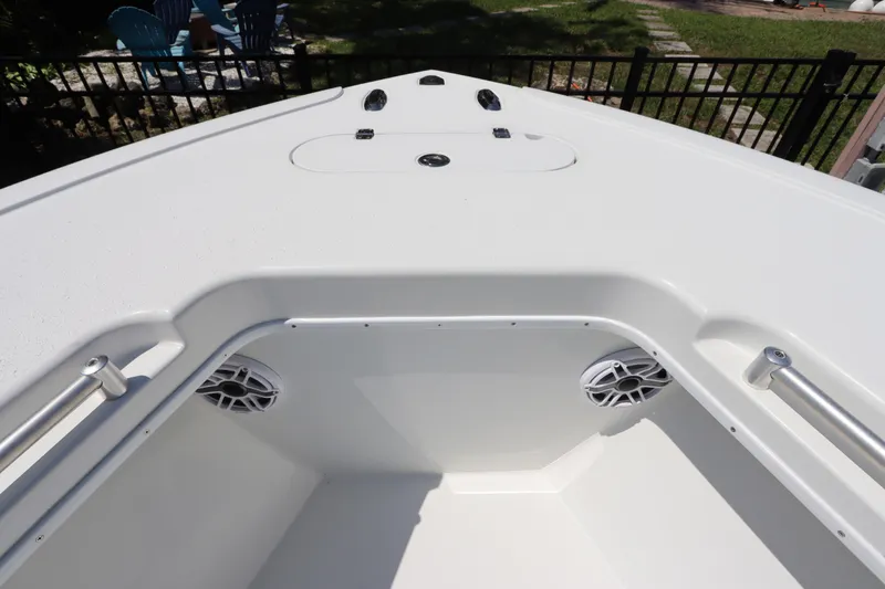 Slide: The Image of 2013 Yellowfin 32 Offshore boat deck with speakers and railing. - 39