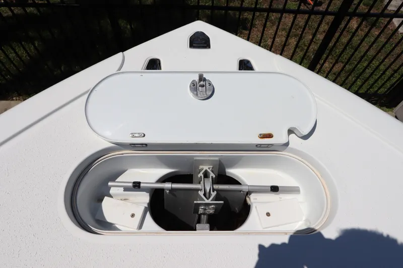 Slide: The Image of Bow anchor compartment of 2013 Yellowfin 32 Offshore boat, featuring a closed hatch. - 40