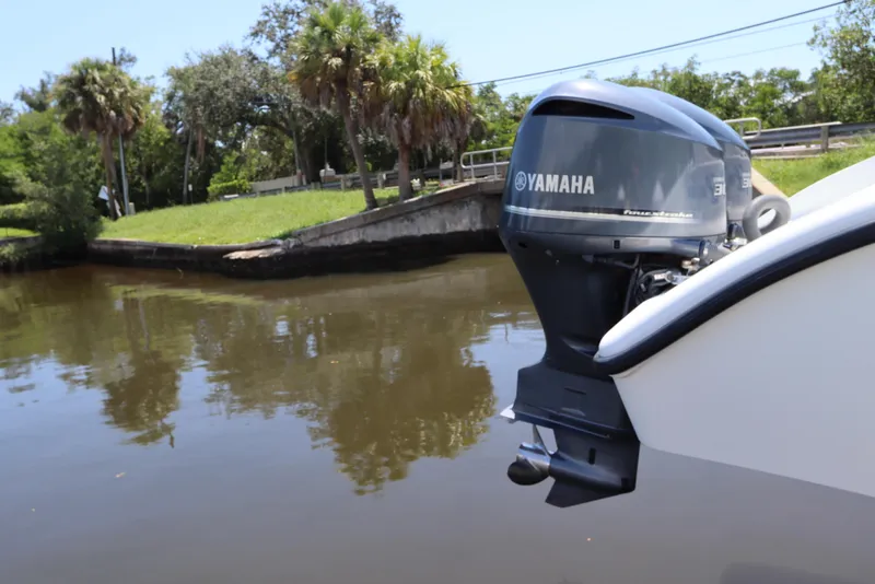 Slide: The Image of 2013 Yellowfin 32 Offshore boat with Yamaha outboard motor on a calm river. - 6
