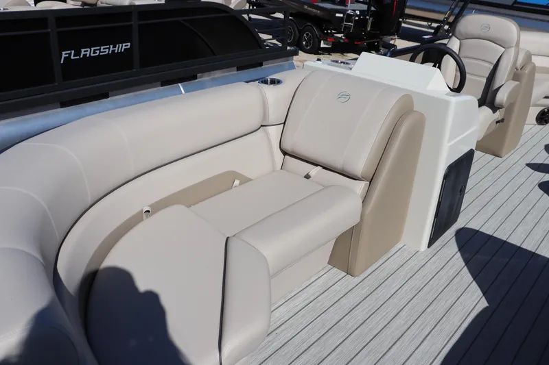 Slide: The Image of 2025 Flagship Endurance 22 CU Tritoon with luxurious beige seating and modern design. - 2