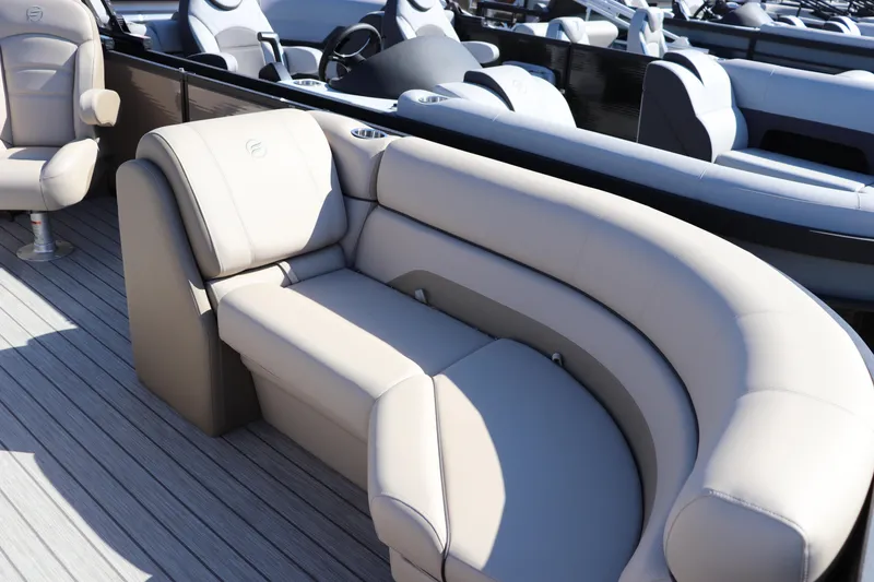 Slide: The Image of Luxurious seating on 2025 Flagship Endurance 22 CU Tritoon boat, featuring plush beige upholstery. - 3