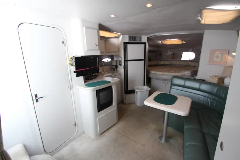 Slide: The Image of Interior of 1994 Cruisers Yachts Esprit 3775 with kitchenette and seating area. - 15