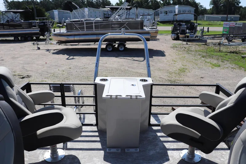 Slide: The Image of 2025 Flagship Discover 22 RF boat interior with seating and control panel. - 10