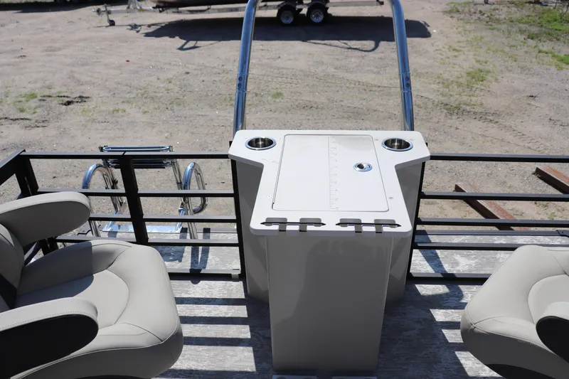 Slide: The Image of 2025 Flagship Discover 22 RF boat interior with seating and control panel. - 7