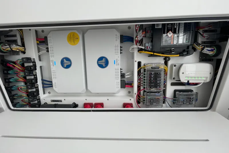 Slide: The Image of Electrical panel of 2023 Crevalle 33 CSF boat, showcasing wiring and components. - 13
