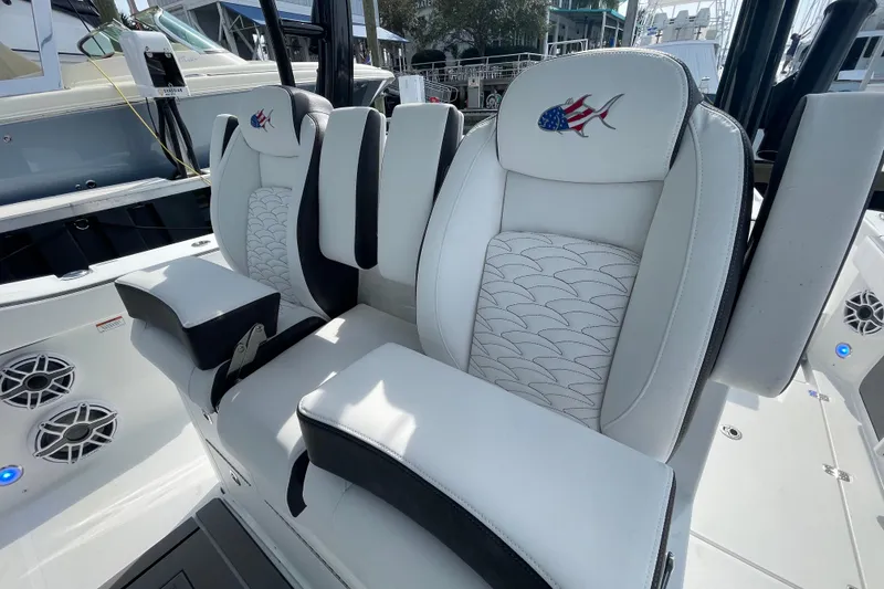 Slide: The Image of 2023 Crevalle 33 CSF boat seats with custom embroidery and sleek design. - 16