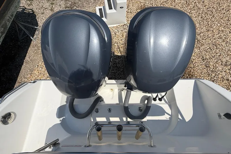 Slide: The Image of Twin outboard motors on a 2009 Century 2901 Center Console boat. - 6
