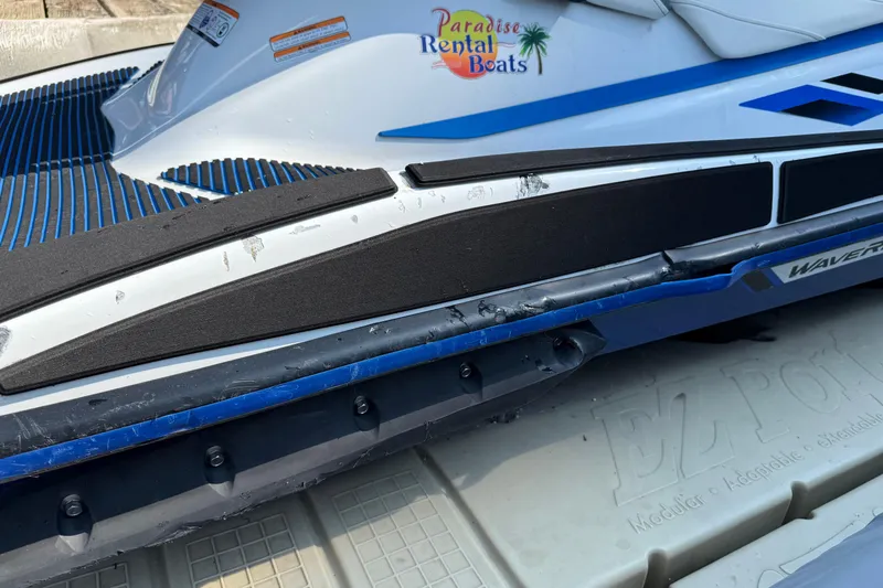 Slide: The Image of 2020 Yamaha WaveRunner VX jet ski on dock, featuring blue and black design. - 6