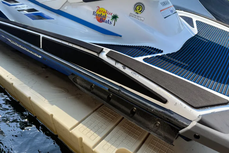 Slide: The Image of 2020 Yamaha WaveRunner VX jet ski docked, featuring "Paradise Rental Boats" logo. - 7