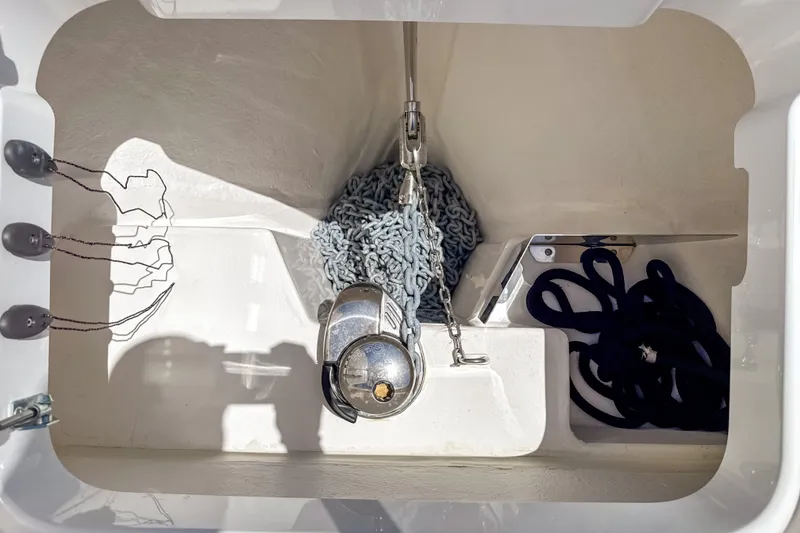 Slide: The Image of Anchor compartment of 2025 Nimbus Tender 11 with chain and rope storage. - 31