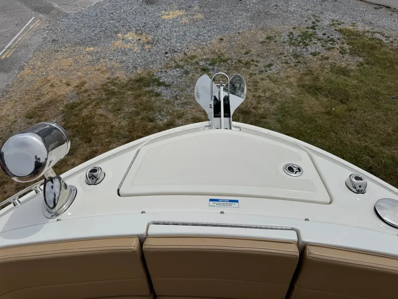 Slide: The Image of 2022 Sea Ray SLX 310 boat bow with anchor and seating area. - 44