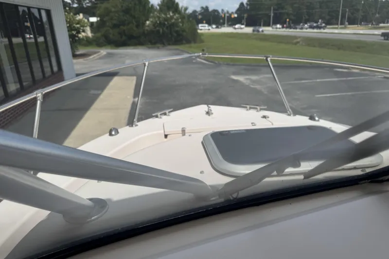 Slide: The Image of 2005 Grady-White Seafarer 228 boat bow view in parking lot. - 15