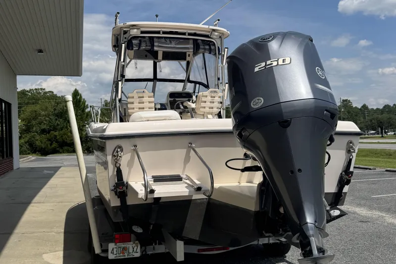 Slide: The Image of 2005 Grady-White Seafarer 228 boat with Yamaha 250 outboard motor, parked outdoors. - 22