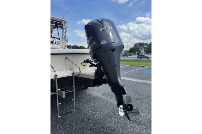 Slide: The Image of 2005 Grady-White Seafarer 228 with Yamaha 250 outboard motor in parking lot. - 6
