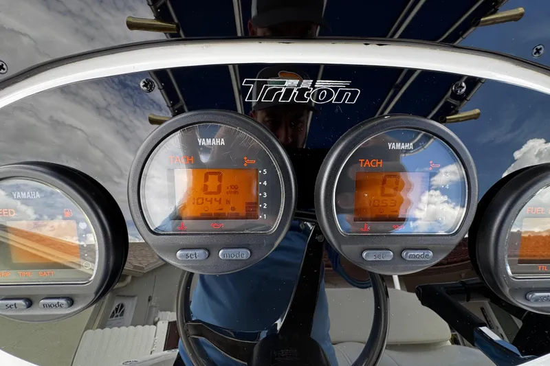 Slide: The Image of Close-up of 2003 Triton 2895 CC boat dashboard with Yamaha tachometers. - 45
