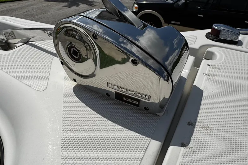 Slide: The Image of Chrome Lewmar winch on 2003 Triton 2895 CC boat deck. - 57