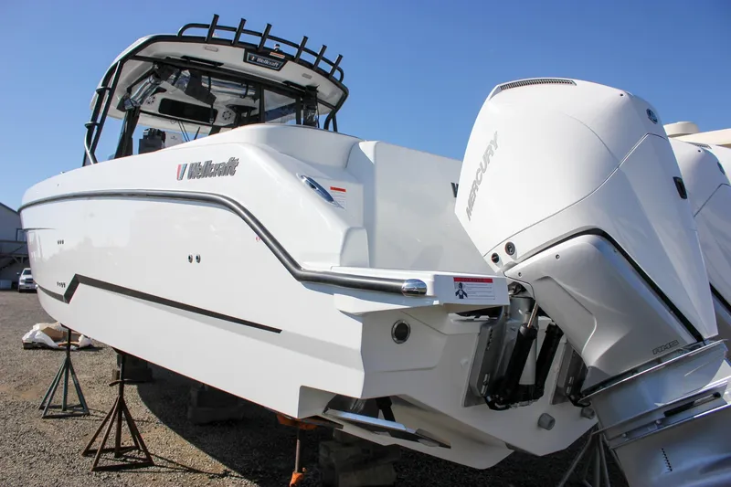 Slide: The Image of Interior view of 2026 Wellcraft 38 T-Top boat with Garmin navigation system. - 14