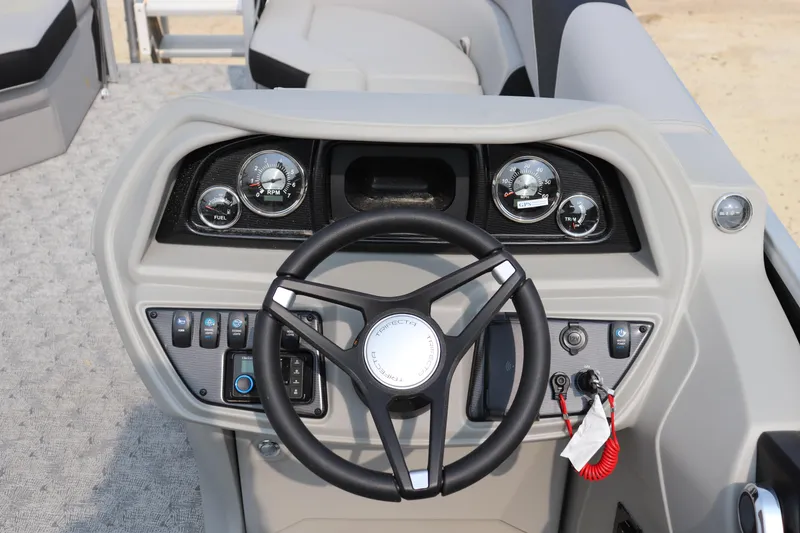 Slide: The Image of Steering console of 2025 Trifecta 22 C LE boat with gauges and controls. - 5