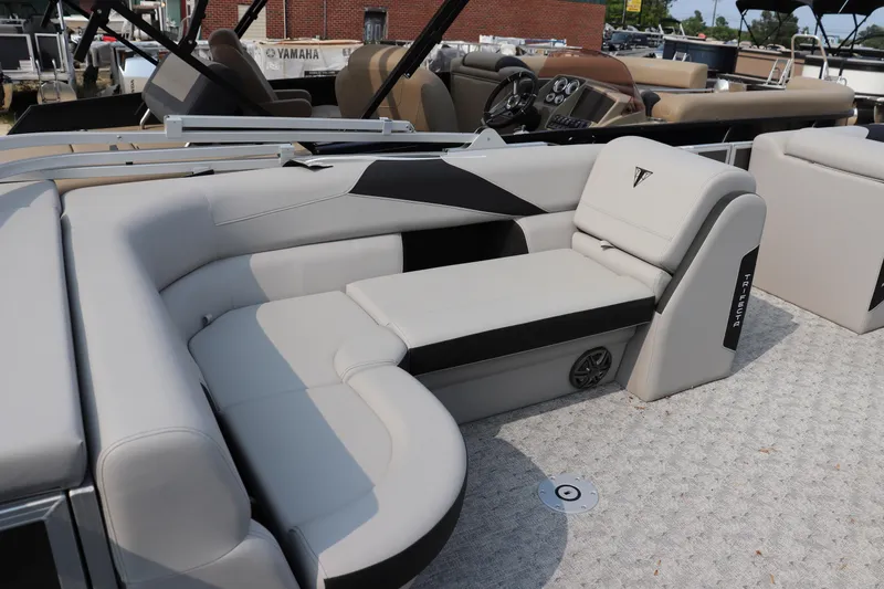 Slide: The Image of 2025 Trifecta 22 C LE pontoon boat with luxurious seating and modern design. - 7