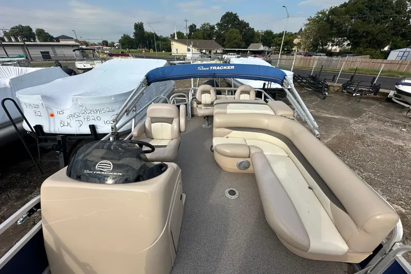 Slide: The Image of 2015 Sun Tracker Fishin' Barge 22 DLX pontoon boat with spacious seating and canopy. - 18