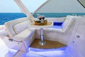 Slide: The Image of Luxurious seating area on 2026 Grady-White Freedom 345 boat with ocean view. - 8