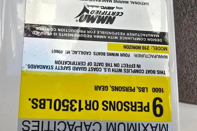 Slide: The Image of 2007 Four Winns 210 Horizon SS BR capacity label, 9 persons or 1350 lbs. - 16