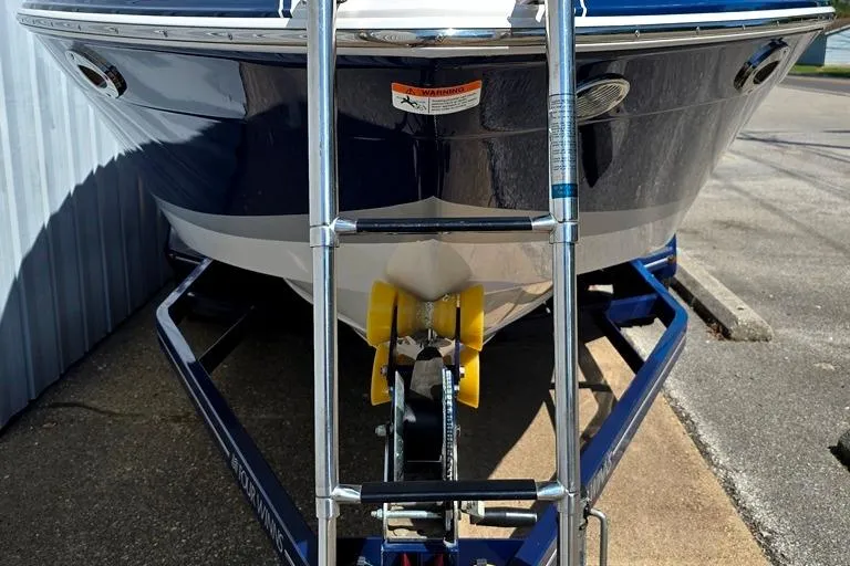 Slide: The Image of 2007 Four Winns 210 Horizon SS BR boat on trailer, front view with ladder. - 17