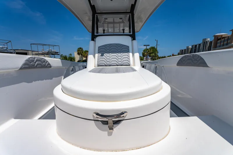 Slide: The Image of 2022 Twin Vee 280 GFX CC boat interior with sleek seating and modern design. - 15