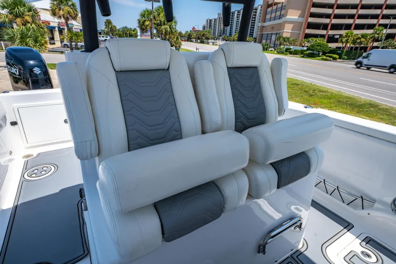 Slide: The Image of 2022 Twin Vee 280 GFX CC boat seats with modern design and comfortable padding. - 20
