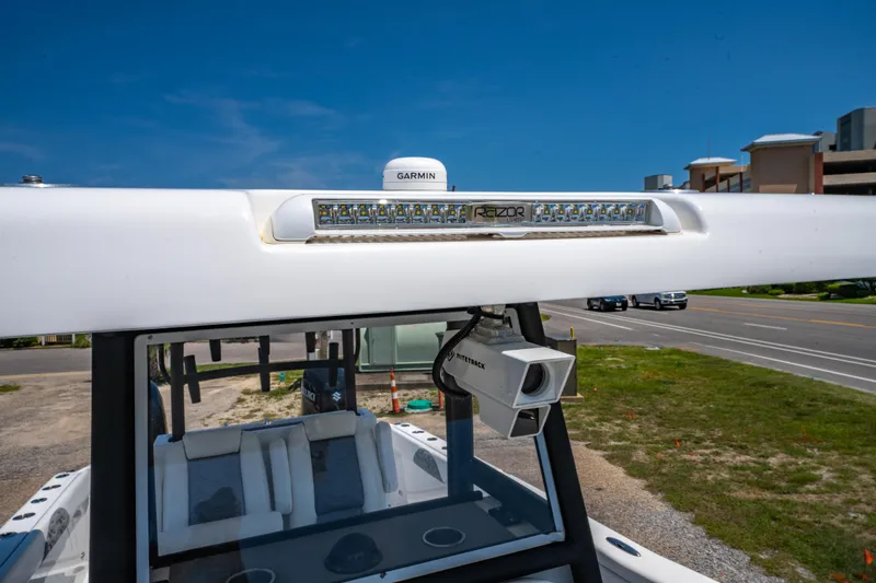 Slide: The Image of 2022 Twin Vee 280 GFX CC boat with Garmin equipment and Razor light bar. - 25