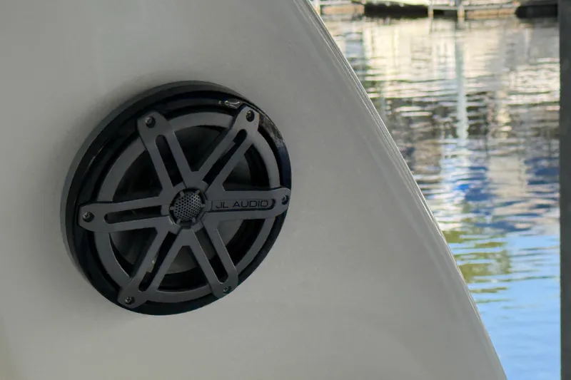 Slide: The Image of JL Audio speaker on 2006 Sea Ray 340 Sundancer, dockside view. - 21