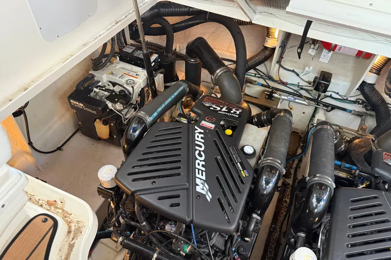 Slide: The Image of Engine room of 2006 Sea Ray 340 Sundancer with Mercury engines and Kohler power system. - 23