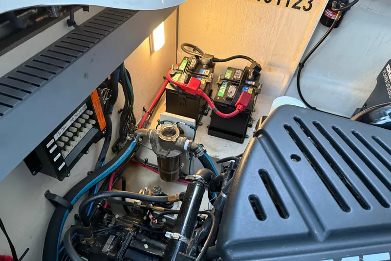 Slide: The Image of Engine compartment of 2006 Sea Ray 340 Sundancer with batteries and wiring. - 26
