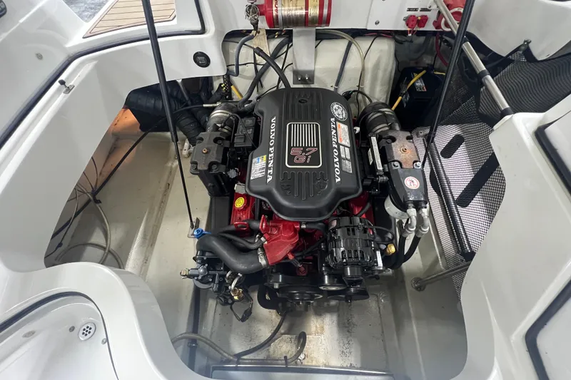 Slide: The Image of 2006 Cobalt 232 boat engine compartment with Volvo Penta 5.7 Gi engine. - 12