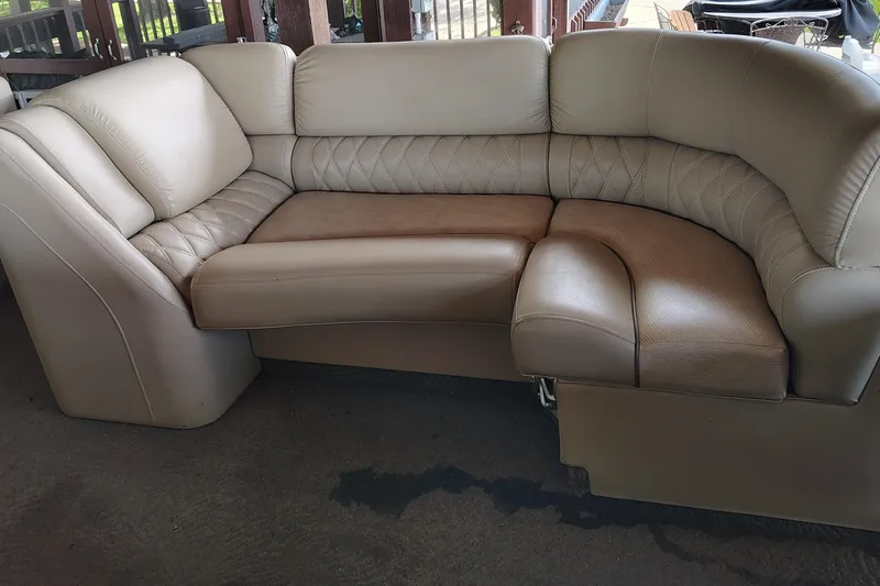 Slide: The Image of Beige leather seating on a 2014 Bennington 2575 QCW I/O boat. - 15