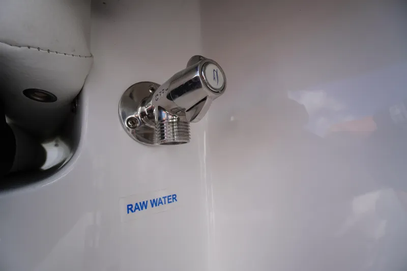 Slide: The Image of Chrome raw water outlet on 2026 Tidewater 220 LXF boat. - 46
