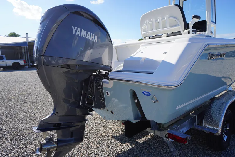Slide: The Image of 2026 Tidewater 220 LXF boat with Yamaha outboard motor on trailer. - 81
