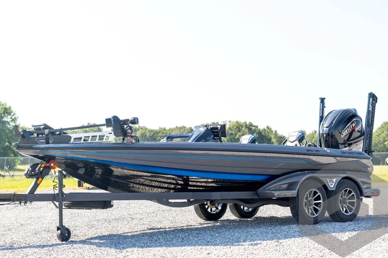 The Image of 2026 Skeeter FXR21 Apex boat on trailer, featuring sleek design and modern equipment. - 1