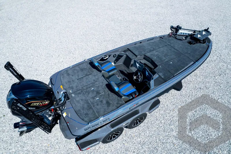 Slide: The Image of 2026 Skeeter FXR21 Apex boat with Yamaha motor, aerial view on gravel surface. - 100