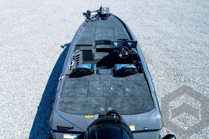 Slide: The Image of 2026 Skeeter FXR21 Apex boat with spacious deck and modern controls. - 101