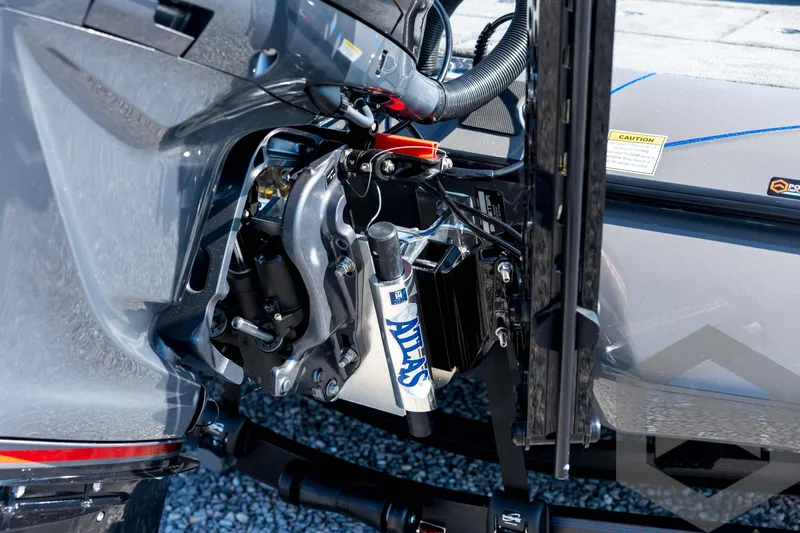 Slide: The Image of 2026 Skeeter FXR21 Apex boat engine detail with Atlas hydraulic jack plate. - 18