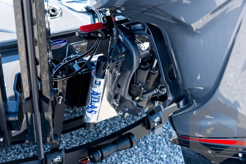 Slide: The Image of 2026 Skeeter FXR21 Apex boat engine detail with Atlas hydraulic components. - 19
