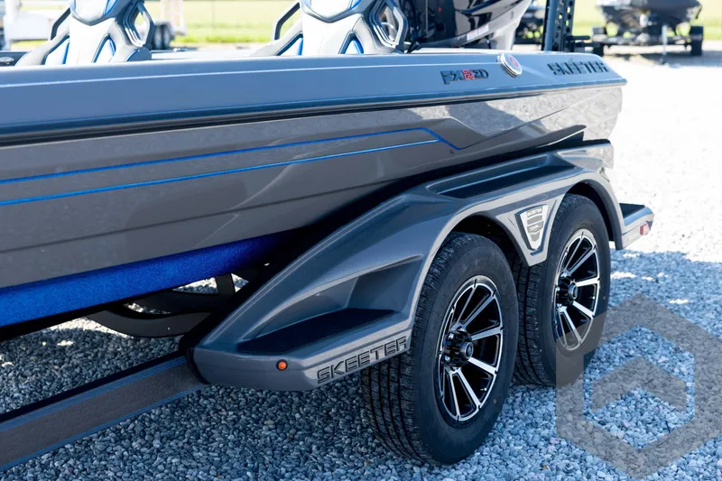 Slide: The Image of 2026 Skeeter FXR21 Apex boat trailer with sleek design and dual wheels. - 29