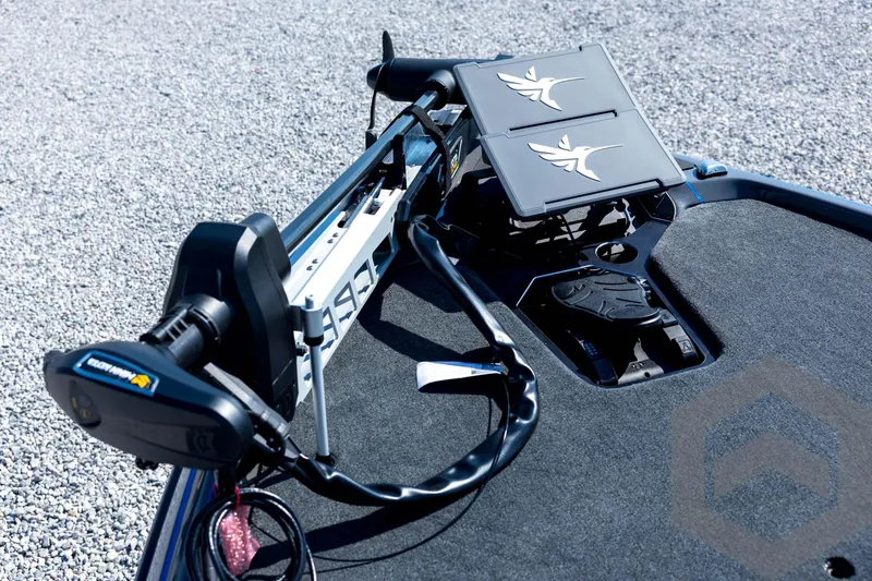 Slide: The Image of 2026 Skeeter FXR21 Apex boat deck with advanced trolling motor and control panel. - 36