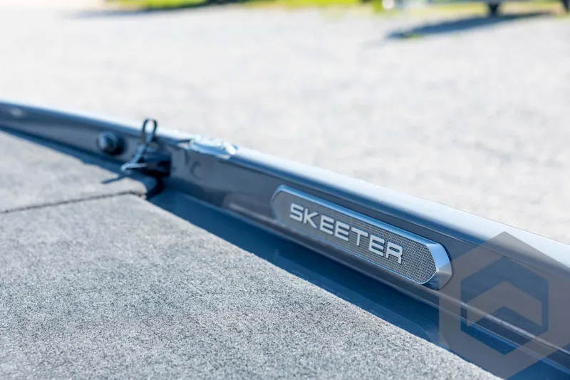Slide: The Image of 2026 Skeeter FXR21 Apex boat detail with logo on deck. - 42