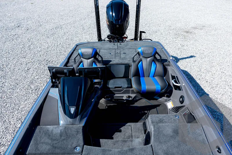 Slide: The Image of 2026 Skeeter FXR21 Apex boat interior with dual seats and advanced dashboard. - 58